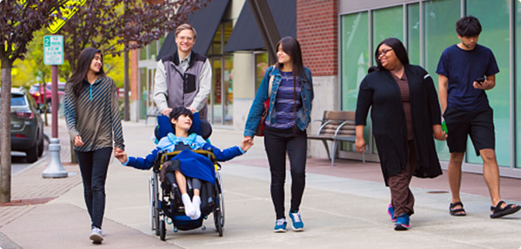 happy family walking on the street